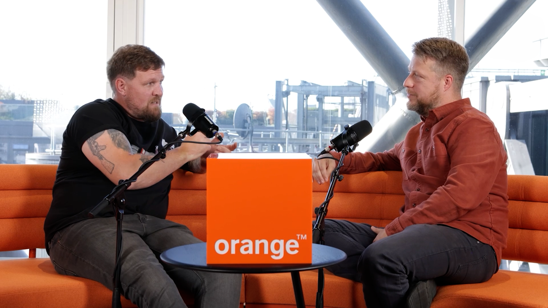 Full-service podcast production in action, with The Podcast Guys recording a branded podcast on location for Orange
